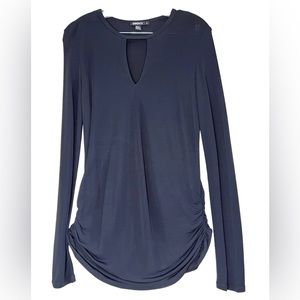 DKNY slinky top black with rushing hip and sleeves. Deep V neck size M.